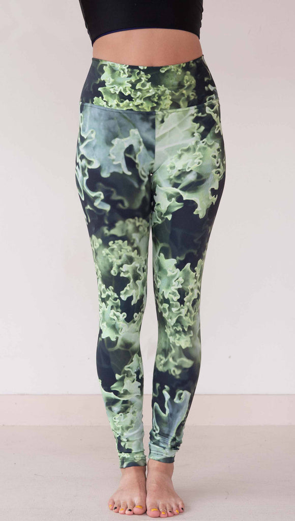 Model wearing WERKSHOP Leggings printed with a macro image of green kale.