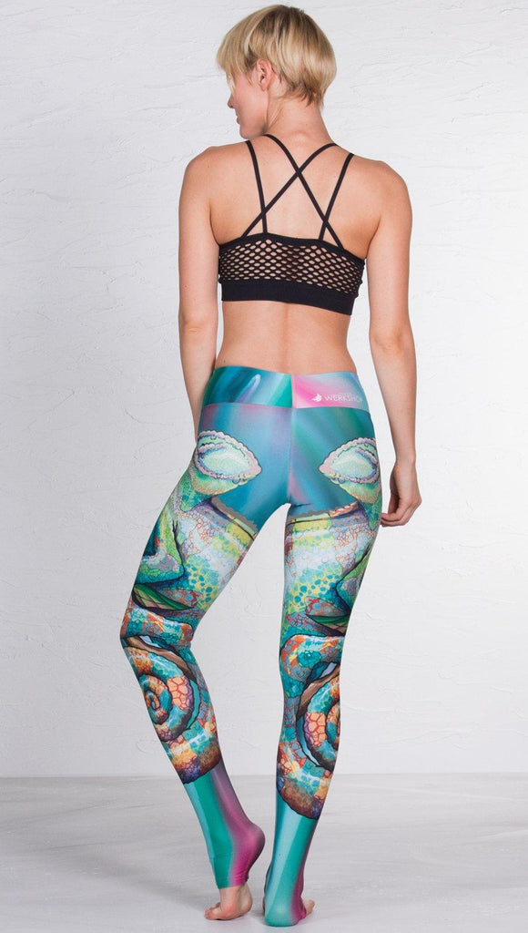 back view of model wearing colorful chameleon printed full length leggings