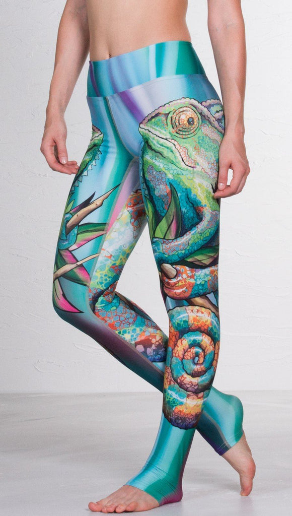 close up front view of model wearing colorful chameleon printed full length leggings