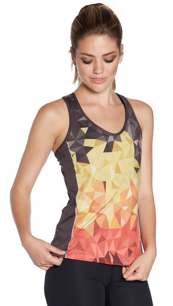 closeup front view of model wearing geometric ombre flames printed tank top 